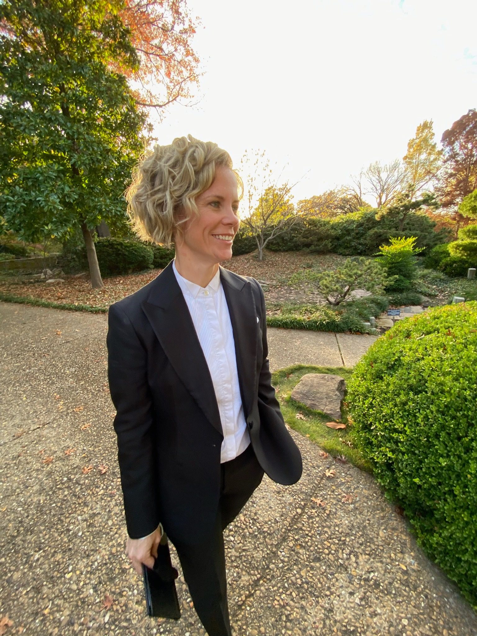 Chelsie dressed for an outdoor wedding ceremony